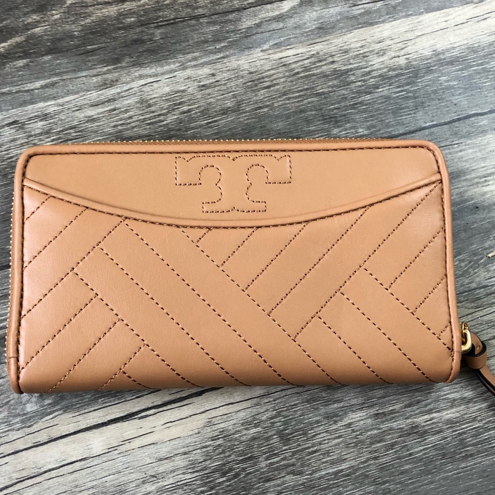 Tan Tory Burch Zip Wallet.
